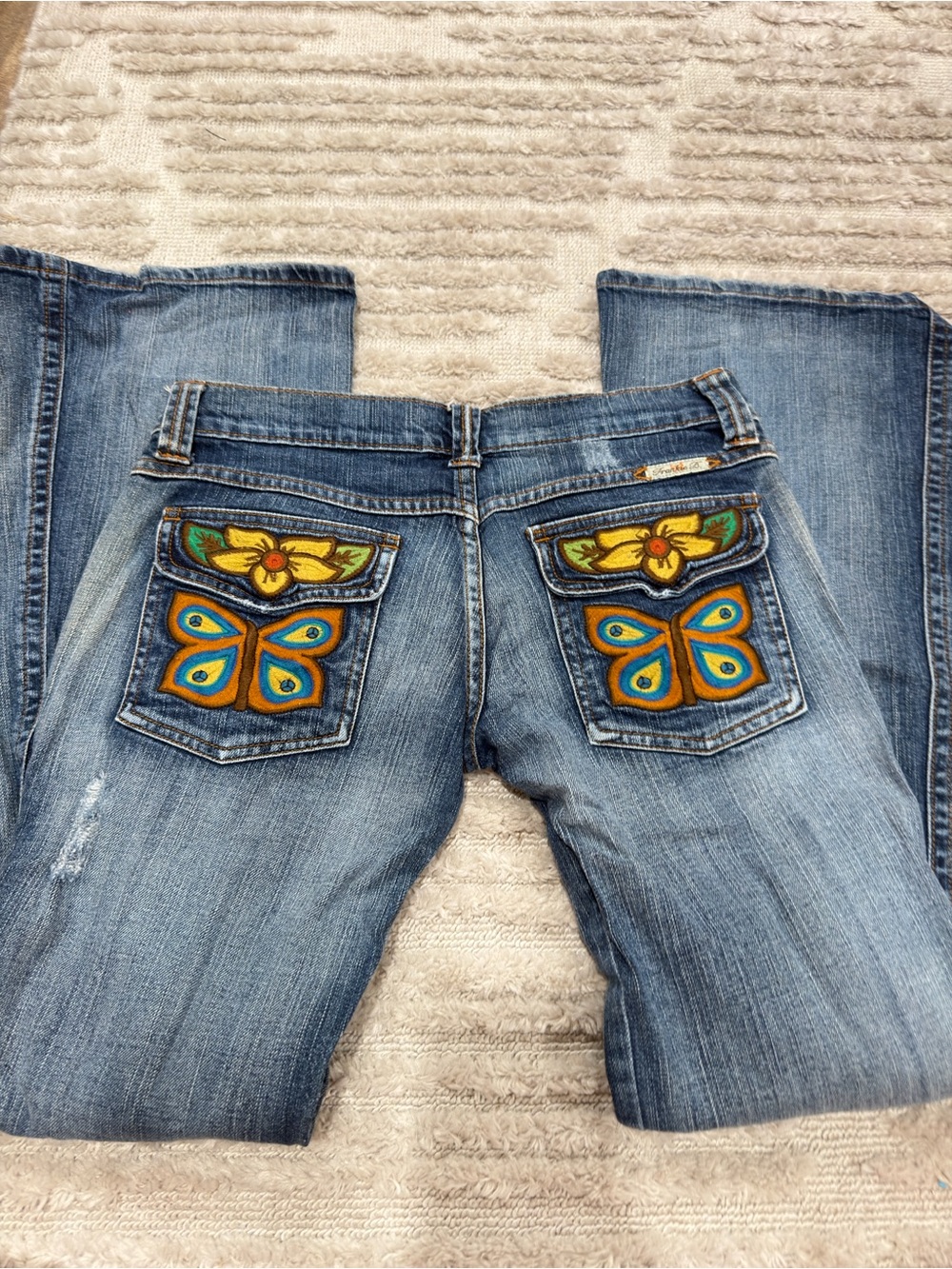 Frankie B. Light Blue Bootcut Jeans with Embroidered Butterfly Pockets